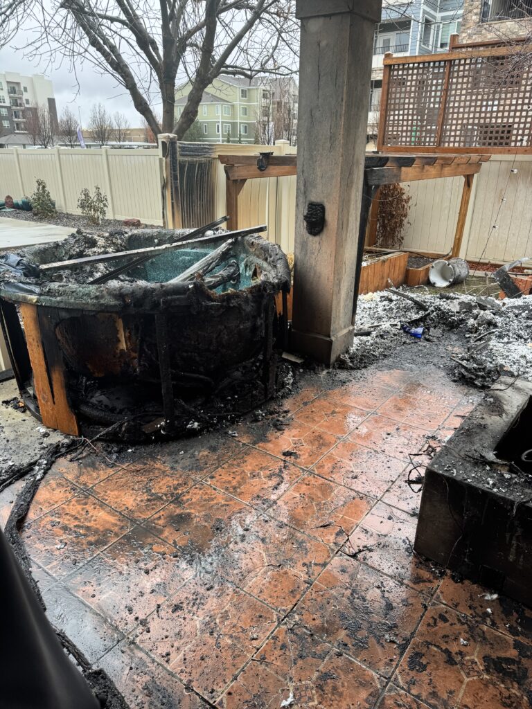 Fire damage of outside patio being burnt with terracota tile.